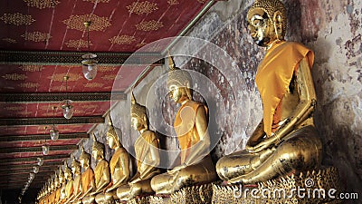 Temple Balcony. Buddhas On Stucco Base And Old Wall Stock Photo