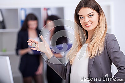 Meeting with agent in office, buying renting apartment or house, buyers of real estate ready to conclude a deal, two women Stock Photo