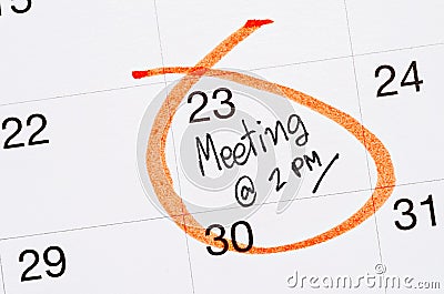 Meeting appointment written in a calendar. Stock Photo
