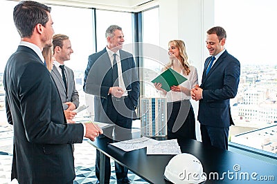 Meeting of architects and business investors Stock Photo