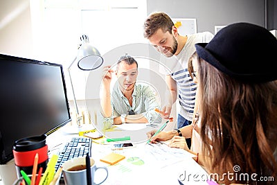 Meeting of co-workers and planning next steps of work Stock Photo