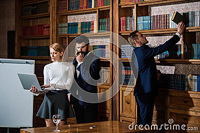 Meeting concept. University students have important meeting in library. Group of people in meeting room. Great business Stock Photo