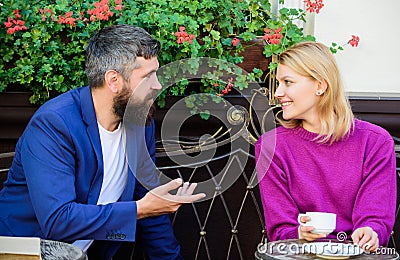 Meeting people first date. Couple terrace drinking coffee. Casual meet acquaintance public place. Romantic couple Stock Photo