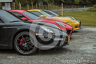 Meeting porsche in Colombia four cars red and yellow Editorial Stock Photo