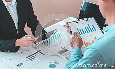 Meeting a team of businessmen, Executives and accountants meeting about the company`s revenue graph in the office with laptops an Stock Photo