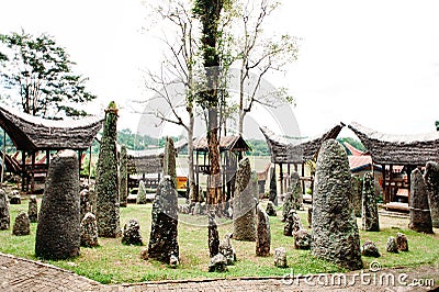 Megaliths or menhirs of Tana Toraja. Old torajan burial site in Bori village, Rantepao, Sulawesi, Indonesia. Stock Photo