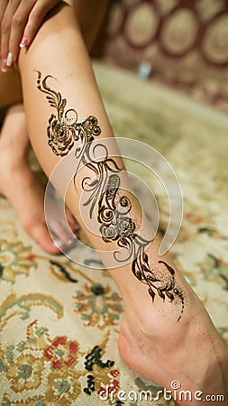 Mehndi. Henna pattern on model`s foot. UAE. Stock Photo