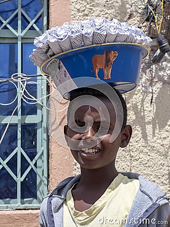MEKELE, ETHIOPIA, APRIL 30th. 2019, Boy sells wrapped nuts, April 30th. 2019, Mekele, Ethiopia Editorial Stock Photo