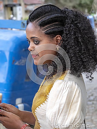 MEKNES, ETHIOPIA, APRIL 28th.2019, Ethiopian women in the city have beautiful clothes and have artistic hairstyles, April 28th. Editorial Stock Photo