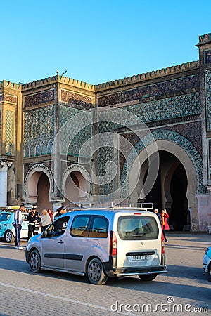 Road with cars in front of the main and most beautiful gate of Meknes Bab-El-Mansur Editorial Stock Photo