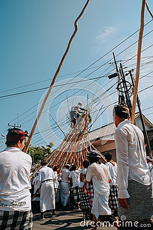 mekotek tradition in badung bali with a bamboo Editorial Stock Photo