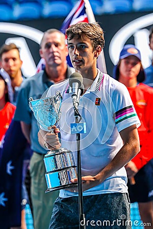 2019 Australian Open champion Lorenzo Musetti of Italy during trophy presentation after his Boys` Singles final match in Melbourne Editorial Stock Photo