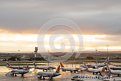 Melbourne, Victoria, Australia - July 3rd 2020: Melbourne Tullamarine airport with aeroplanes grounded on the tarmac. Editorial Stock Photo