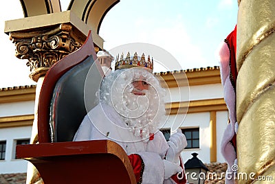 Melchor Magi sitting in his carriage, La Cala de Mijas, Spain. Editorial Stock Photo