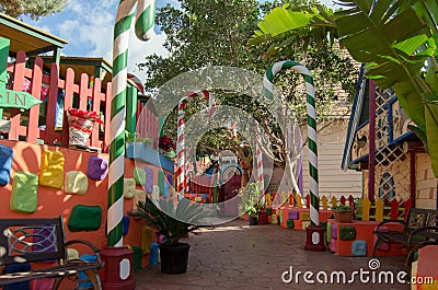 Mellieha, Malta, 30 december 2018 - Colorfull candy city for children in Popeye village movie set post office house entrance and Editorial Stock Photo