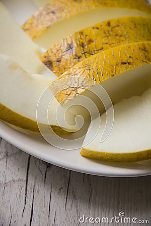 Melon on wooden background Stock Photo