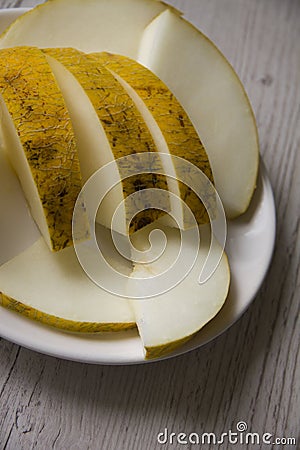 Melon on wooden background Stock Photo