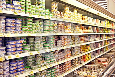 Melted cheese on supermarket shelves Editorial Stock Photo