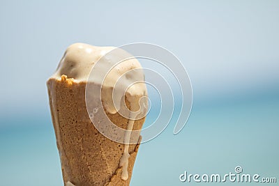 Melted ice cream cone in a waffle cone Stock Photo