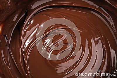 Melting chocolate, melted delicious chocolate for praline icing Stock Photo