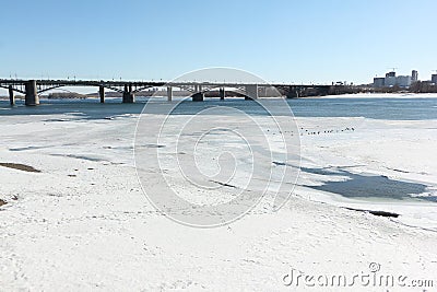 Melting ice on the Ob River in the spring, Communal bridge, Novosibirsk, Russia Stock Photo