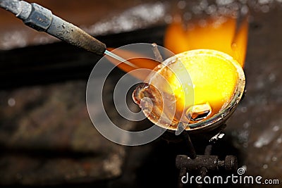 Melting silver in a jewelry workshop Stock Photo