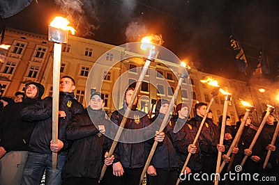 Members of the nationalist organizations hold torches as they take part in a rally marking the 70th death anniversary of Roman Shu Editorial Stock Photo