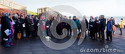 Members of the POP UP Choir at the New Years Day Swim. Editorial Stock Photo