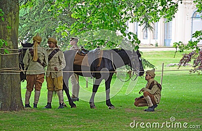 Members of the Punjab Lancers in World War One uniform looking after horses. Editorial Stock Photo