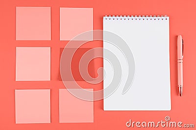 Memo stickers and notebook on orange background Stock Photo
