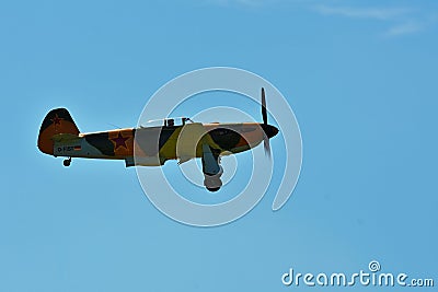 Memorial Airshow. Aircraft Jak-9 in aviation fair and century air combats. Editorial Stock Photo