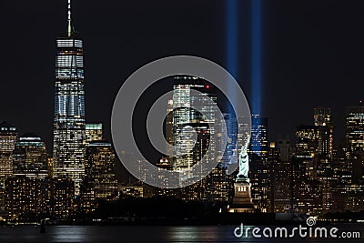 9/11 Memorial Beams with Statue of Liberty and Lower Manhattan Editorial Stock Photo