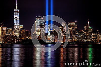 9/11 Memorial Beams with Statue of Liberty and Lower Manhattan Editorial Stock Photo