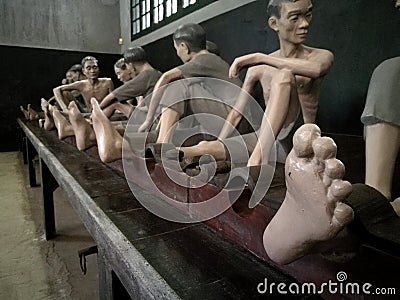 Memorial jail interior with sculptures in Hoa Lo Prison Editorial Stock Photo