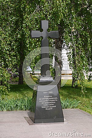 Memorial monument with a huge black cross, put in memory of the outstanding figures of the Kiev Theological Academy Editorial Stock Photo