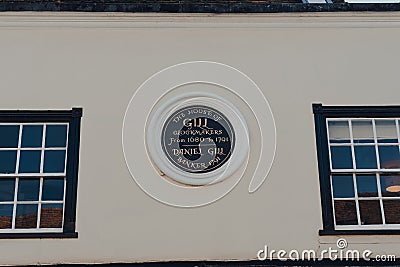 Memorial plaque on the house of Daniel Gill of Gill Clockmakers in Rye, East Sussex, England Editorial Stock Photo