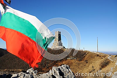 Memorial Shipka and bulgarian flag Stock Photo