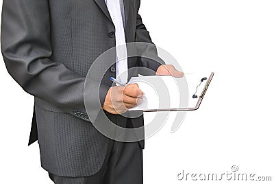 Men in dark suit writes on clipboard with pen Stock Photo