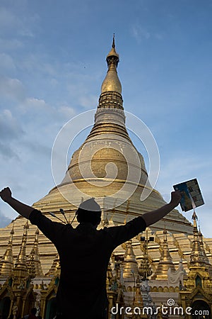 Men enjoying the view of the famous shwedagon pagoda in myanmar Editorial Stock Photo