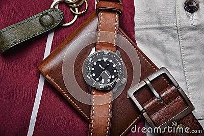 Men fashion and accessories, Wrist watch with brown leather strap, Stylish men stuff, Diving watch Stock Photo