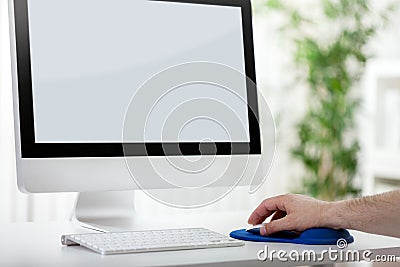 Men hand using computer mouse Stock Photo