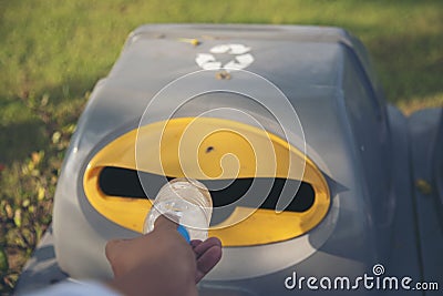 Men hands trow Trash cans for sorting garbage recycle bin waste plastic container collection. Reuse, reduce, recycle sorting Stock Photo