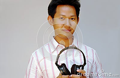 Men holding headphone Stock Photo