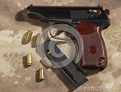 Men load ammo in the clip Makarov pistol Stock Photo