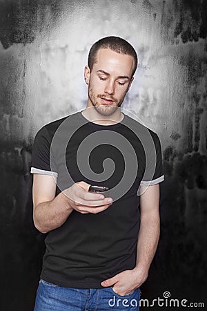 Men with mobile phone typing SMS Stock Photo