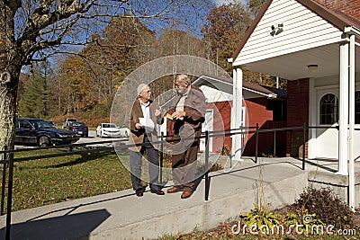 Men outside a church in Appalachia Editorial Stock Photo