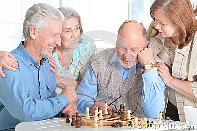 Men playing chess Stock Photo