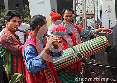 Men playing Flutes and Drum for Folk Dance of Assam, India Editorial Stock Photo