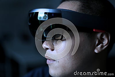 Men Playing Virtual Reality with Hololens with effects Stock Photo