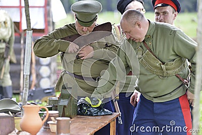 Men reloads the weapon Editorial Stock Photo